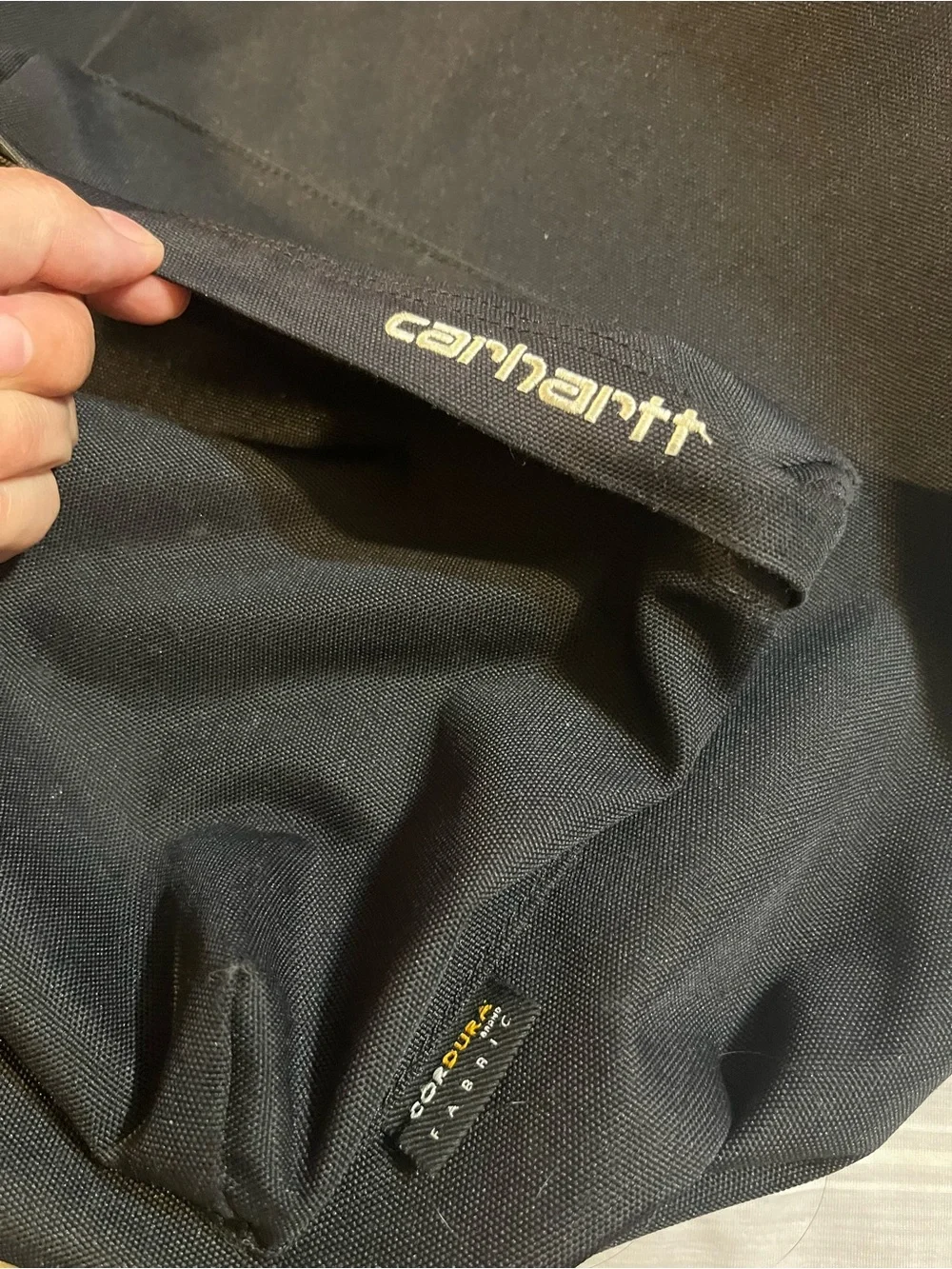 Carhartt WIP Payton Backpack Black Rounded Silhouette White Embroidered Branding